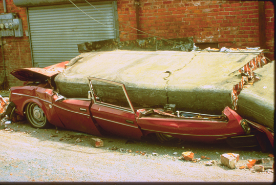 Photo of car crushed in Ferndale quake